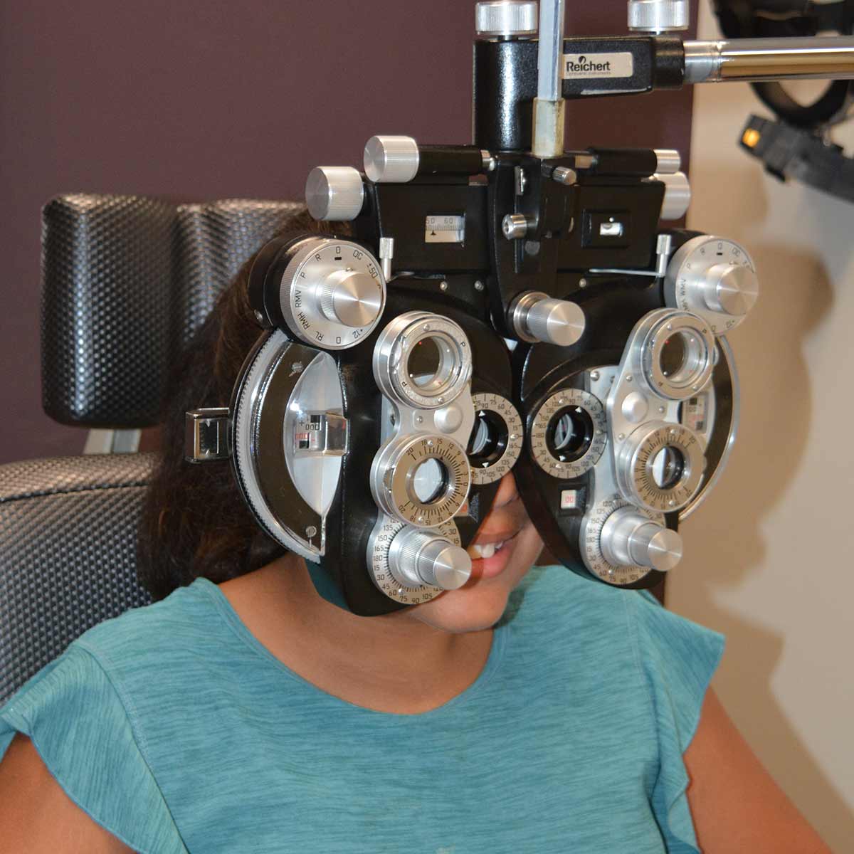 Girl getting eye exam