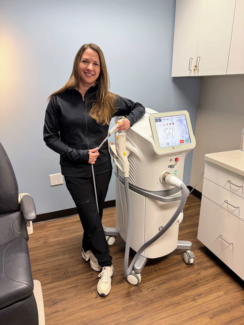 Dr. Sara Grell using OptiLight by Lumenis device for dry eye treatment at Hellerstein & Brenner Vision Center